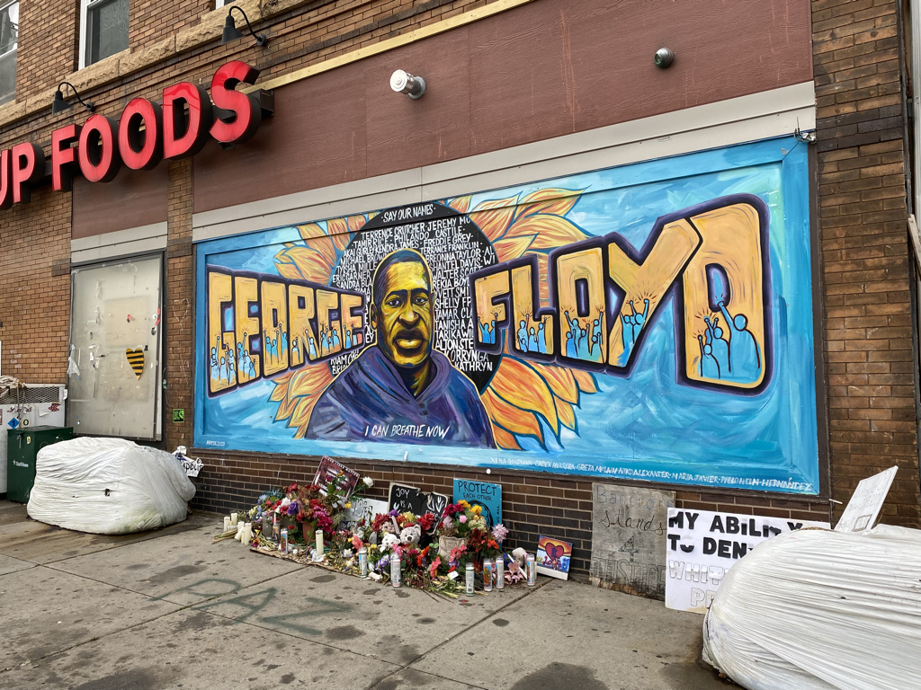 a mural of george floyd that says "I can breathe now"